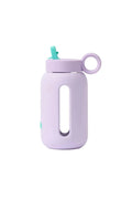 Purple water bottle with a straw on a white background