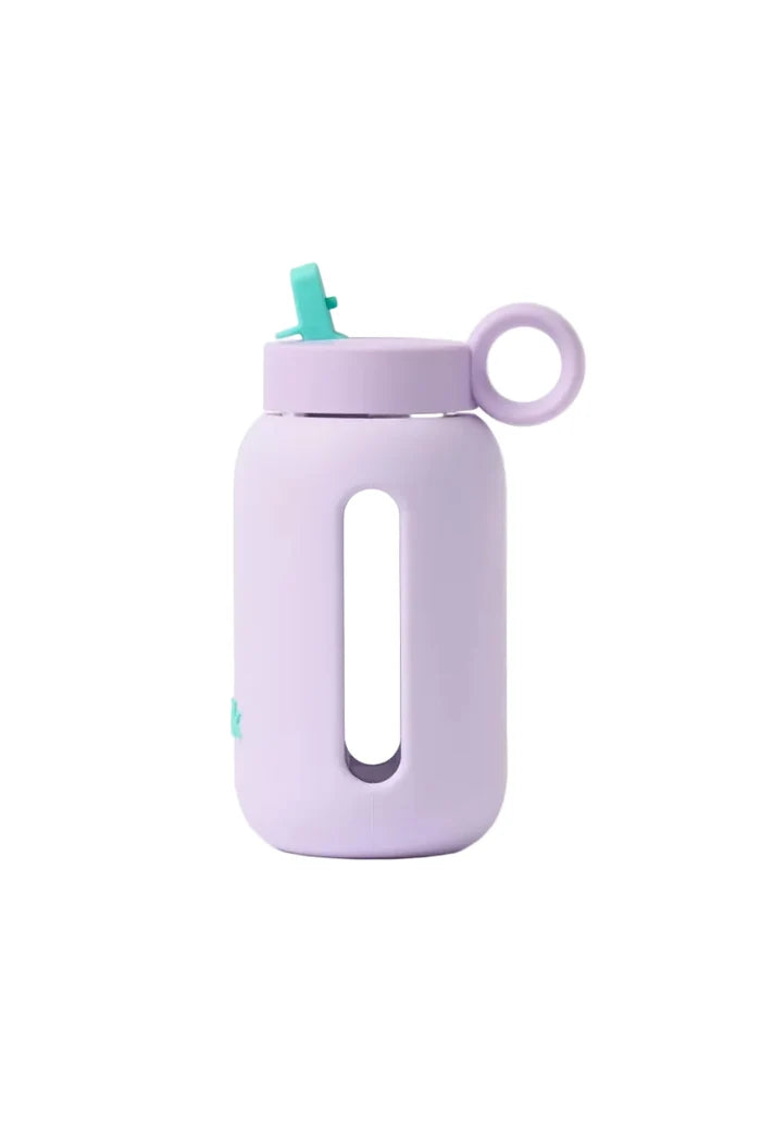 Purple water bottle with a straw on a white background