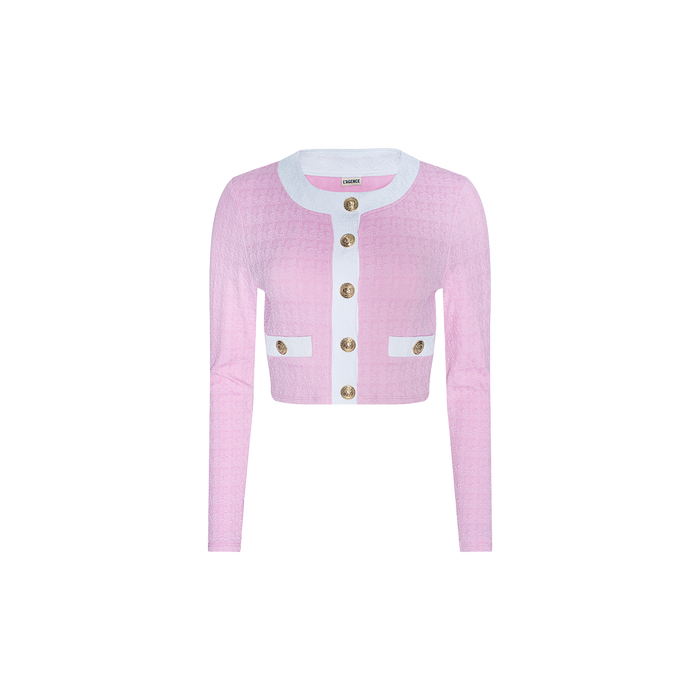 The Adaline Cardigan Cover-Up, a pink cropped cardigan featuring long sleeves, white trim, gold buttons, and two front pockets, makes for a stylish swimsuit cover-up—ideal for transitioning from beach to boat. Shown on a white background.