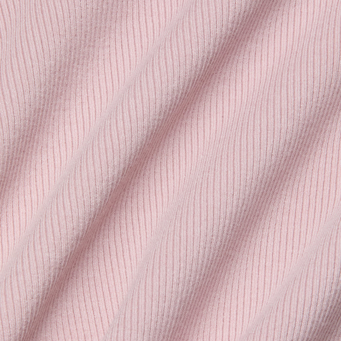 Close-up of the soft, stretch rib fabric in light pink on the Adira Scoopneck Tank, with diagonal folds highlighting the texture and pattern of the material.