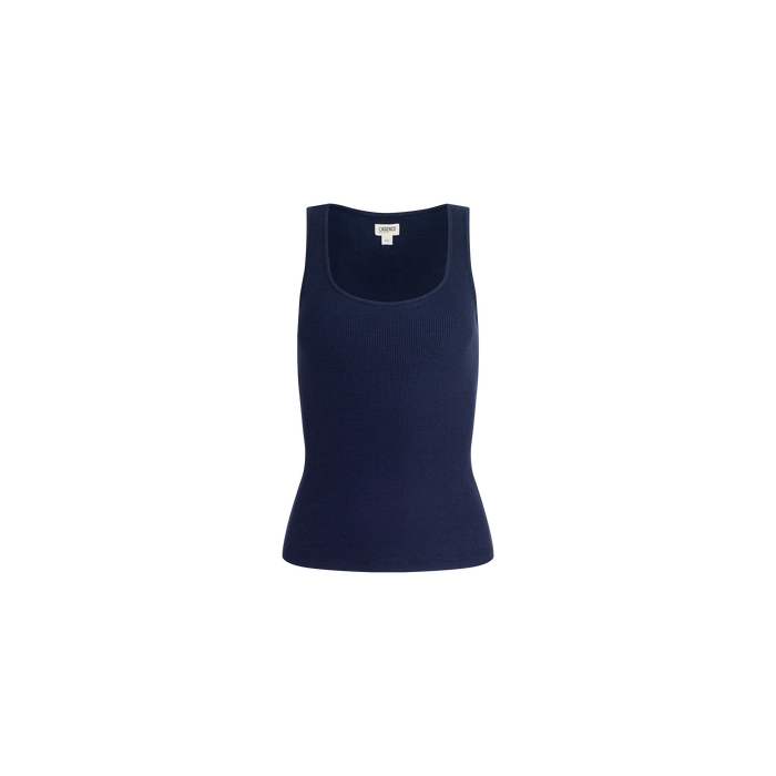 The Adira Scoopneck Tank is a navy blue, sleeveless stretch rib tank top featuring a scoop neckline, shown against a plain white background.