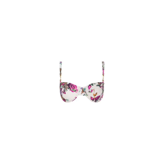 The Alexandria Bikini Top is a white balconette bikini top adorned with a colorful floral print featuring pink and purple flowers and green leaves. It has thin adjustable straps with gold accents.