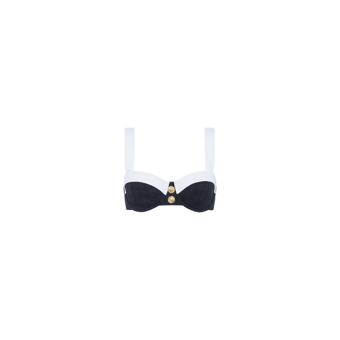 The Alexandria Bikini Top is a black and white balconette style, crafted from textured bouclé fabric with wide white straps and gold button accents on the front, shown against a plain white background.