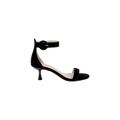The Andelle Kitten-Heel Sandal in black suede features a flared low kitten heel, a single front strap, and a wide ankle strap accented with a large round buckle. Designed for comfort, it includes a memory foam insole. Displayed against a plain white background.
