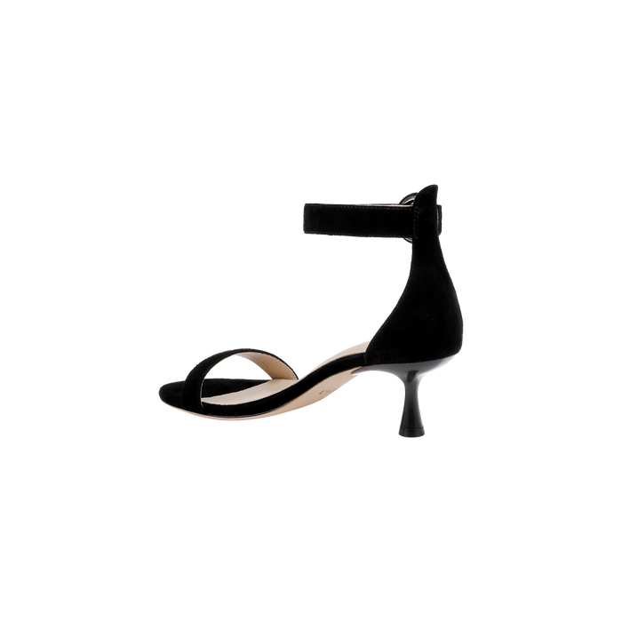 The Andelle Kitten-Heel Sandal in black suede showcases an open toe, a low curved kitten heel, and an ankle strap fastening, complemented by a memory foam insole. Shot in side profile against a plain white background.
