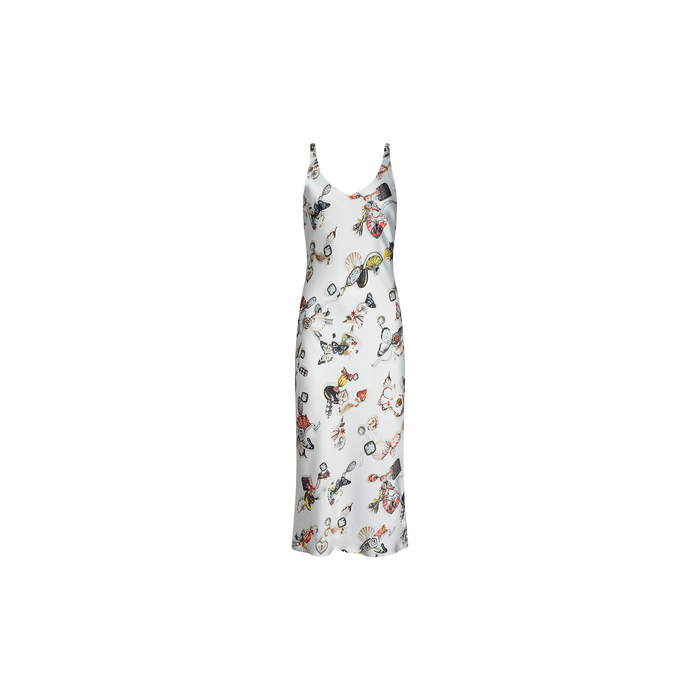 The Anika Slip Dress is a white sleeveless slip dress with thin straps, featuring a butterfly lock print pattern on the fabric.