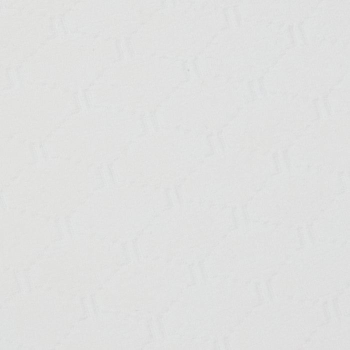 Close-up of the Annabelle Bikini Top’s white textured surface, featuring a subtle geometric pattern of repeating zigzag, triangle, and diamond shapes. The faint, monochromatic design adds gentle depth and visual interest to the otherwise simple background.