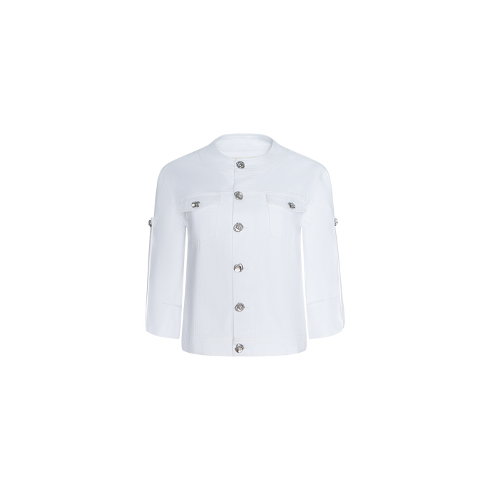The Anouk Jean Jacket is a white, long-sleeve, collarless denim jacket featuring silver buttons down the front and on two chest pockets. Shown against a plain white background, it is designed in a relaxed fit for effortless style.