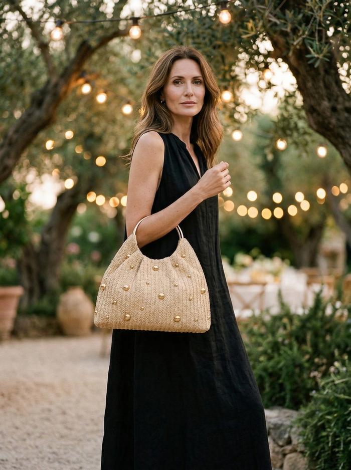 Artisanal Studded Handwoven Raffia Bag with Sculptural Gold Ring Handle LINTICO