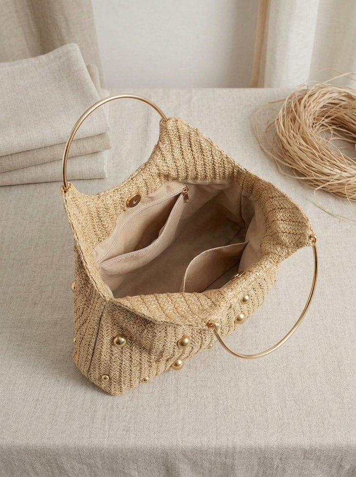 Artisanal Studded Handwoven Raffia Bag with Sculptural Gold Ring Handle LINTICO