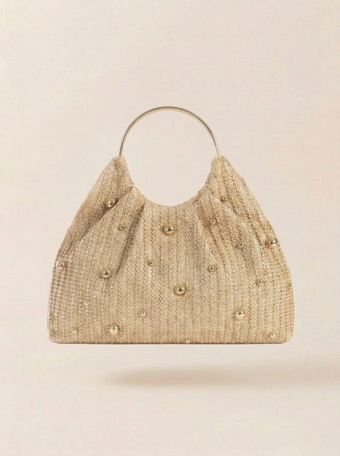 Artisanal Studded Handwoven Raffia Bag with Sculptural Gold Ring Handle LINTICO