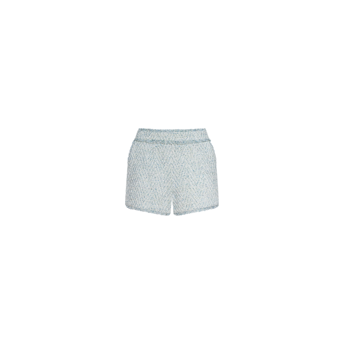 Ashley Tweed Short in light blue chevron tweed, designed with a high waist, classic silhouette, and subtle fringed trim, displayed against a plain white background.