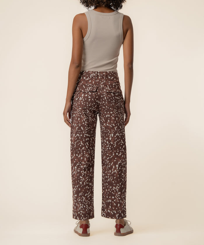 Cocoa high-rise relaxed leg jeans with cream speckled pattern, back view on model.