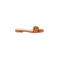 Introducing the Aurelie Buckle Sandal: a brown, square-toed sandal featuring a single wide strap adorned with white and brown stripes and accented by a decorative bamboo buckle, displayed against a plain white background.