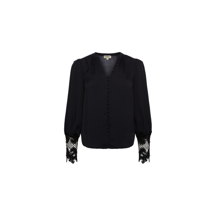The Ava Blouse is a vintage-inspired black blouse featuring long sleeves, fabric-covered buttons down the front, and delicate guipure lace detailing at the cuffs, displayed on a plain white background.
