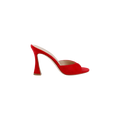 The Avery Suede Open-Toe Mule, shown in profile on a white background, features a single red suede design with an open toe and a sculpted, flared heel.