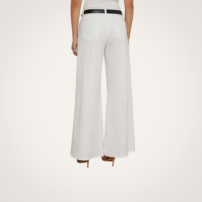 A person is shown from the back wearing the Beau Wide-Leg Jean with a black belt and tan heels against a plain background.