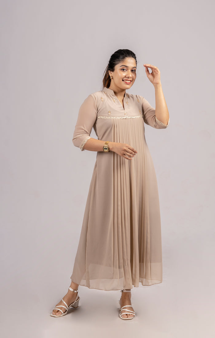Beige shaded georgette A-line kurti with handworked yoke and lace detailing MBS-254