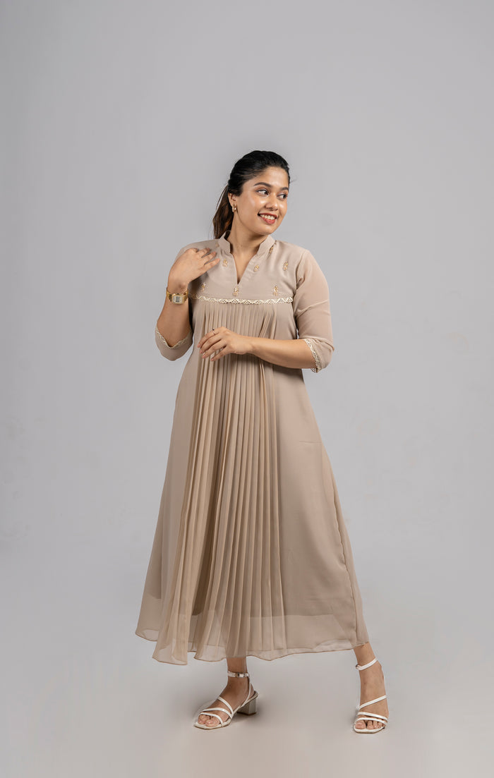 Beige shaded georgette A-line kurti with handworked yoke and lace detailing MBS-254