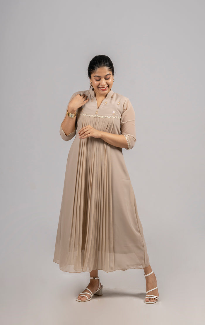 Beige shaded georgette A-line kurti with handworked yoke and lace detailing MBS-254