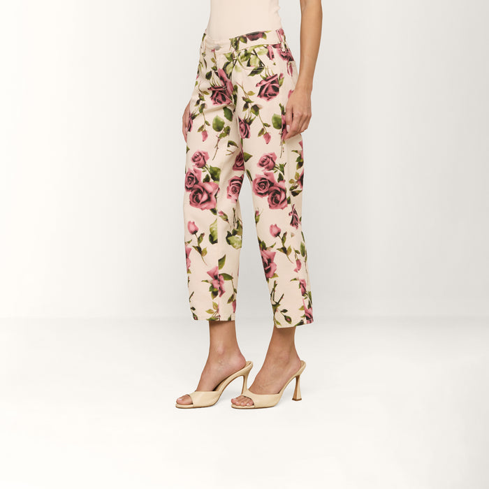 Person wearing Blaine Cropped Stovepipe Jean and beige high-heeled sandals, standing against a plain white background.