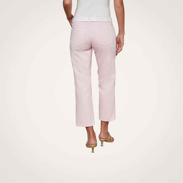 A person is shown from the back against a plain white background, wearing the Blaine Cropped Stovepipe Jean in pastel lilac paired with beige heeled sandals.