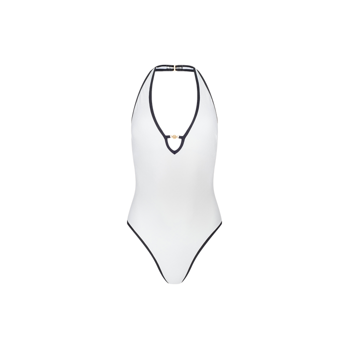 Introducing the Breana Plunge One-Piece Swimsuit: a sophisticated white one-piece designed with a deep plunge neckline, striking black trim along the edges, and a tasteful gold accent at the center front. This halter neck style combines elegance with modern flair and offers UPF 50 protection—perfect for those seeking stylish sun-safe swimwear.