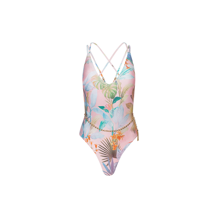 The Breana Plunge One-Piece Swimsuit features a pastel tropical palm print, thin crisscross back straps, and a decorative gold chain belt at the waist. Displayed against a plain white background, this stylish swimsuit offers UPF 50 protection for enhanced sun safety.