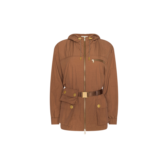 The Calina Windbreaker is a brown hooded jacket featuring gold zippers, a front chest pocket, spacious front pockets with button flaps, a detachable belt bag, and a coordinating belt with a gold buckle. This water-repellent utility-chic piece is shown on a white background.