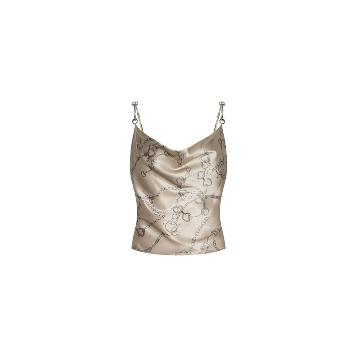 The Calista Silk Camisole is a beige cropped top featuring a cowl neckline, thin shoulder straps, and an elegant horse bit chain print on the fabric. Shown against a plain white background.