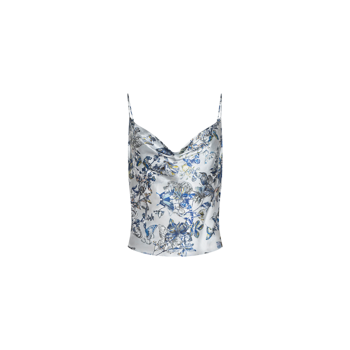 The Calista Silk Camisole features thin straps and a silky fabric adorned with a blue butterfly print and delicate white florals on a light background, displayed on a plain white surface.