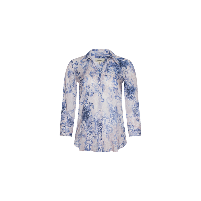 Introducing the Camille Blouse – a sophisticated ivory and blue lace print blouse crafted from soft viscose twill. Featuring a refined floral motif set against a light background, this piece is designed with a classic collar and elegant three-quarter sleeves. Shown here on a plain white surface.