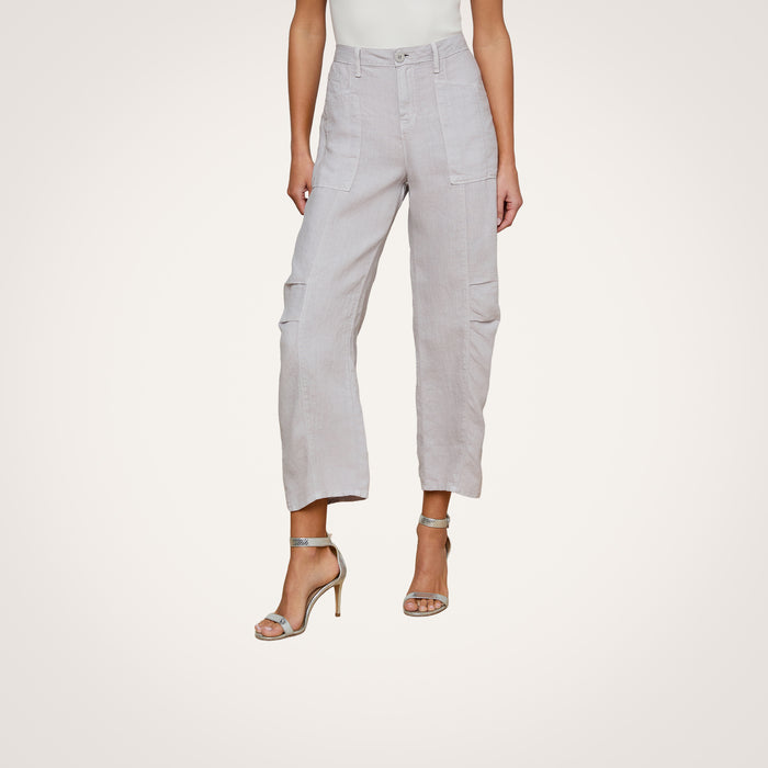 A woman is shown from the shoulders down, wearing the Cody Cropped Linen Pant—a high-waisted, light gray, lightweight linen pant with wide legs and front patch pockets—paired with silver high-heeled sandals against a plain light background. Perfect for warm weather.