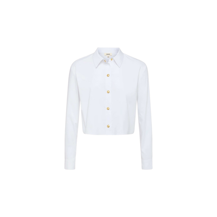The Cosette Shirt is a white, long-sleeve, button-up tailored shirt featuring a classic collar and gold buttons, displayed on a plain white background.