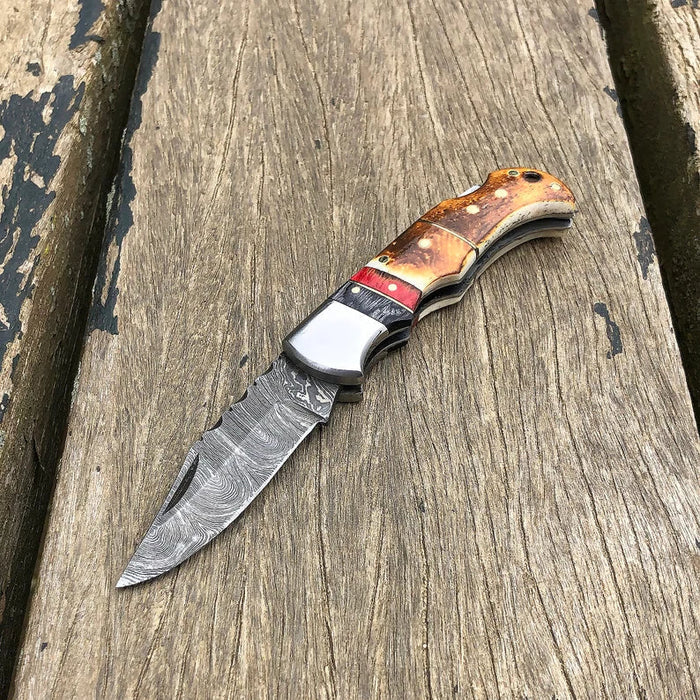 DAMASCUS POCKET KNIFE, HANDMADE FOLDING KNIFE, MADE OF BURNT CAMEL BONE cskforged
