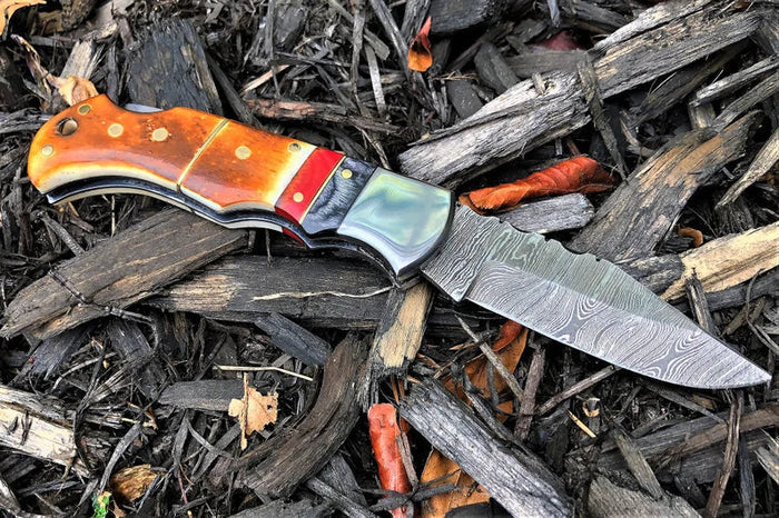 DAMASCUS POCKET KNIFE, HANDMADE FOLDING KNIFE, MADE OF BURNT CAMEL BONE cskforged