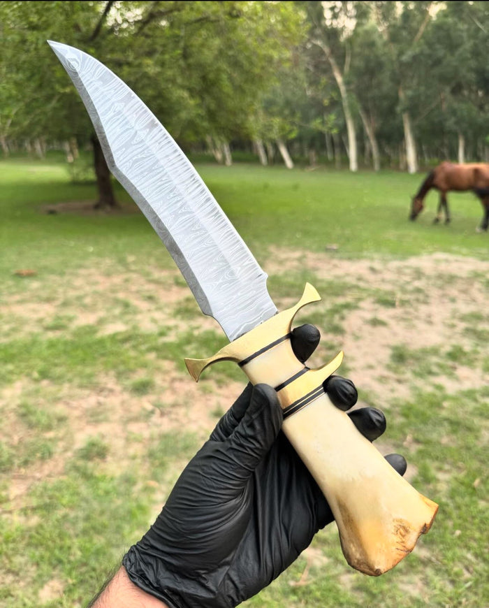 Damascus Steel Camping Knife with Brass Guard and Camel Bone Handle" cskforged