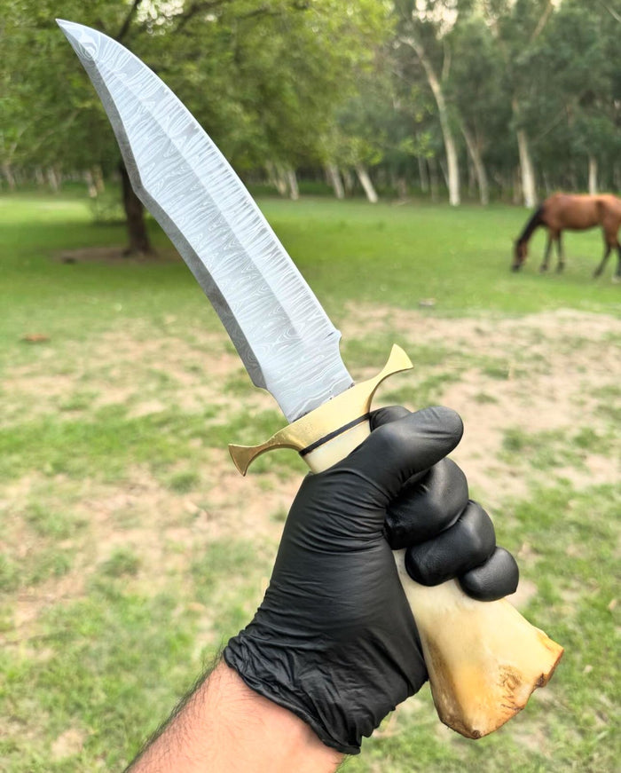 Damascus Steel Camping Knife with Brass Guard and Camel Bone Handle" cskforged