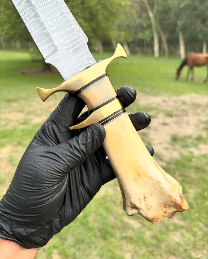 Damascus Steel Camping Knife with Brass Guard and Camel Bone Handle" cskforged