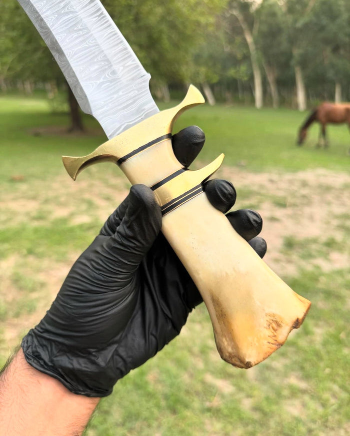 Damascus Steel Camping Knife with Brass Guard and Camel Bone Handle" cskforged
