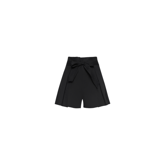 The Damira Poplin Short is crafted from stretch poplin and features an ultra-high waist, self-tie belt, pleated detailing, and a relaxed fit, shown against a plain white background.