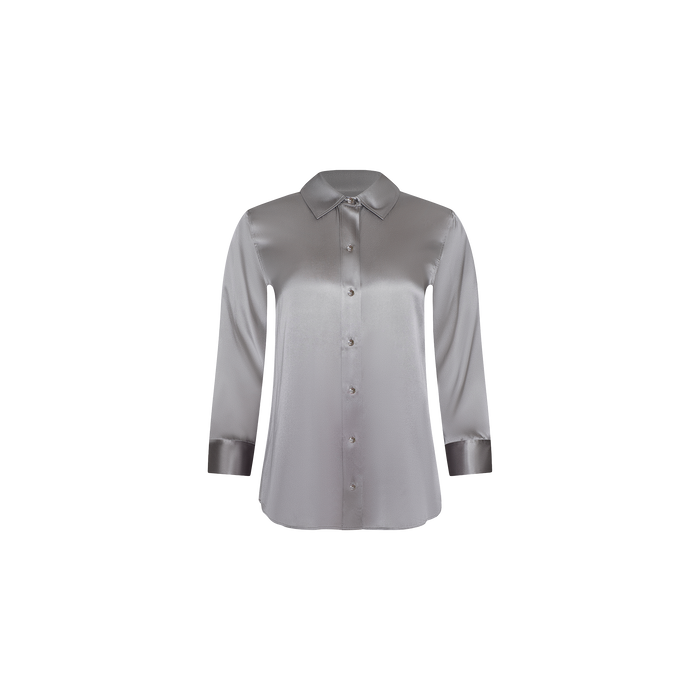 The Dani Silk Blouse is a long-sleeve, button-up top crafted from shiny gray silk charmeuse, featuring a classic collar and cuffed sleeves, shown against a plain white background.