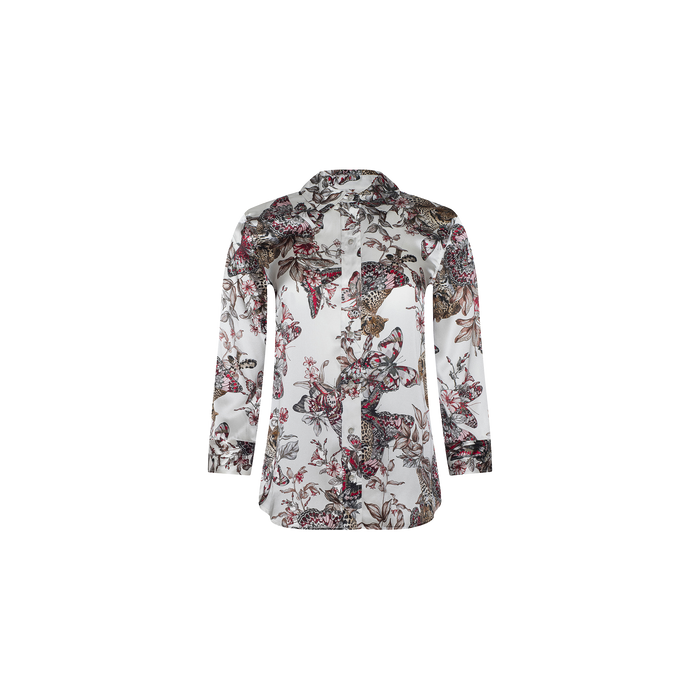 The Dani Silk Blouse is a long-sleeved, button-up shirt featuring a white base adorned with an intricate butterfly jungle print in shades of pink, brown, and gray. It has a pointed collar and offers a relaxed fit.