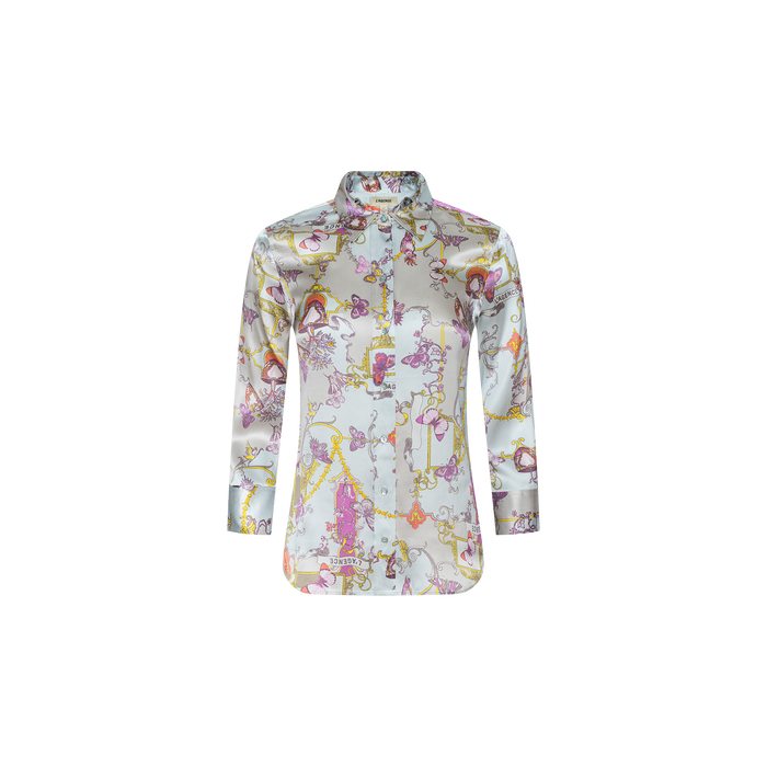 The Dani Silk Blouse features long sleeves and a vibrant abstract baroque toile print in shades of pink, yellow, and purple on a light background, shown against a plain white backdrop.