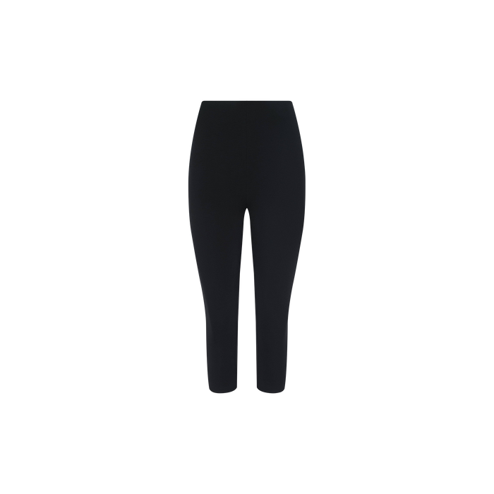 The Dee Capri Pant, shown on a plain white background, features black, high-waisted, ankle-length leggings crafted from stretch ponte fabric. These capris offer a flattering and form-fitting silhouette with no visible patterns or embellishments.