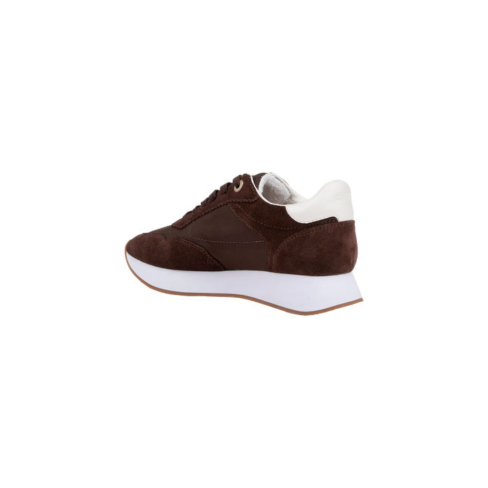 The Deepa Platform Sneaker features chocolate suede and leather construction, white laces, a contrasting white heel tab, memory foam insole, and a chunky white sole. Shown from the side on a plain white background.