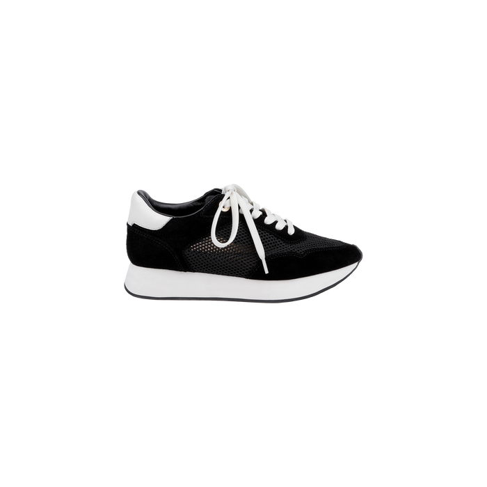 The Deepa Platform Sneaker in black suede features white laces, a white sole, and a white heel detail. Shown from the side against a plain white background, it offers all-day comfort with its memory foam insole.