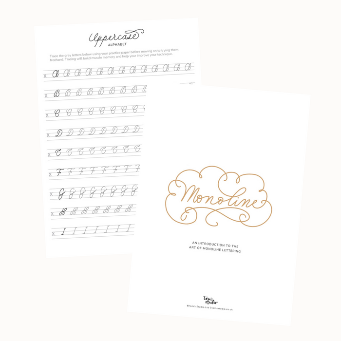 Flat-lay of two printed pages from the Monoline Lettering Guide by Tom’s Studio. One page shows the decorative title cover, and the other features uppercase alphabet tracing exercises.