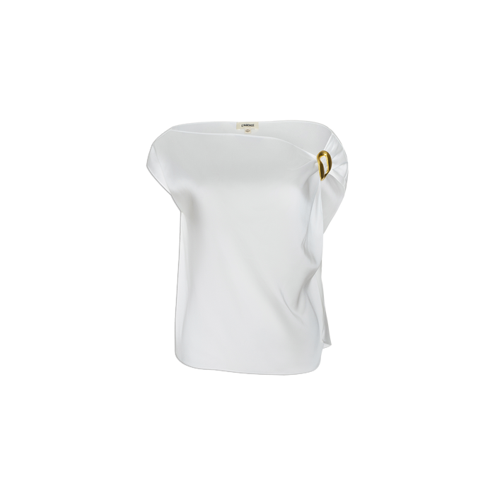 The Driselle Scarf Top is a white, asymmetrical sleeveless satin piece featuring a loose fit and a gold buckle accent that gathers the fabric at one shoulder, shown against a plain white background.