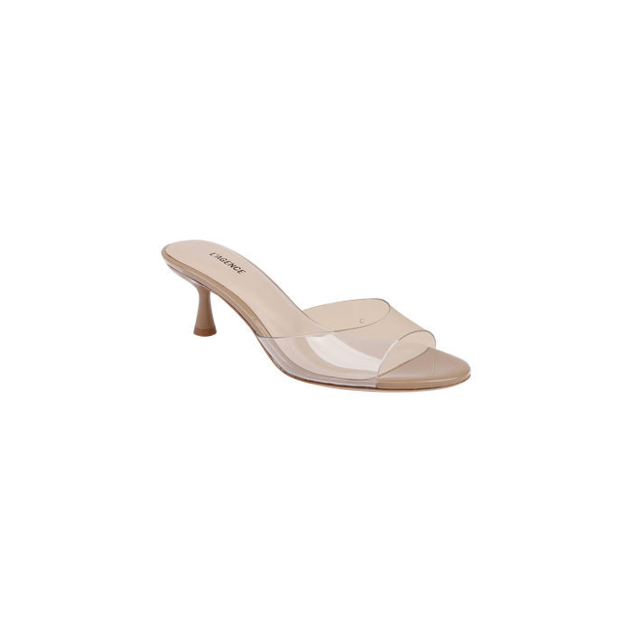 The Esther Kitten-Heel Mule is a single beige sandal featuring a clear vinyl upper and a transparent strap across the toe, with the word LIKEME printed on the insole, displayed against a white background.